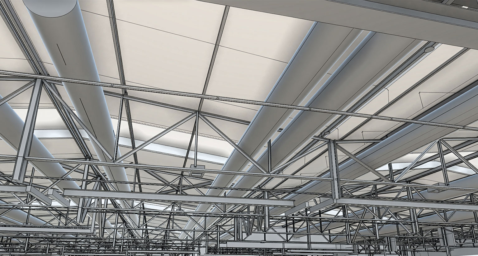 Dachkonstruktion der Industriehalle von unten mit Tragwerk, Lüftung und weiterer TGA